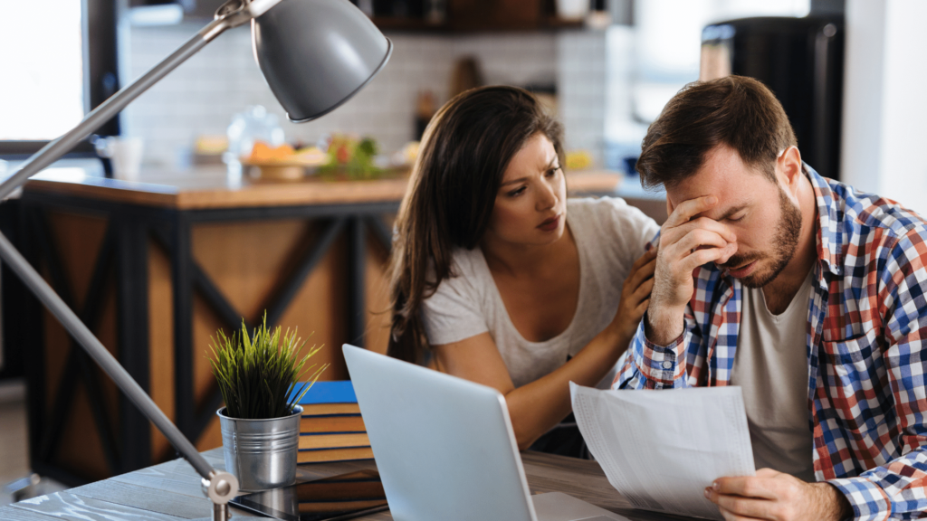Frustrated Couple Upset paying Utility Bill